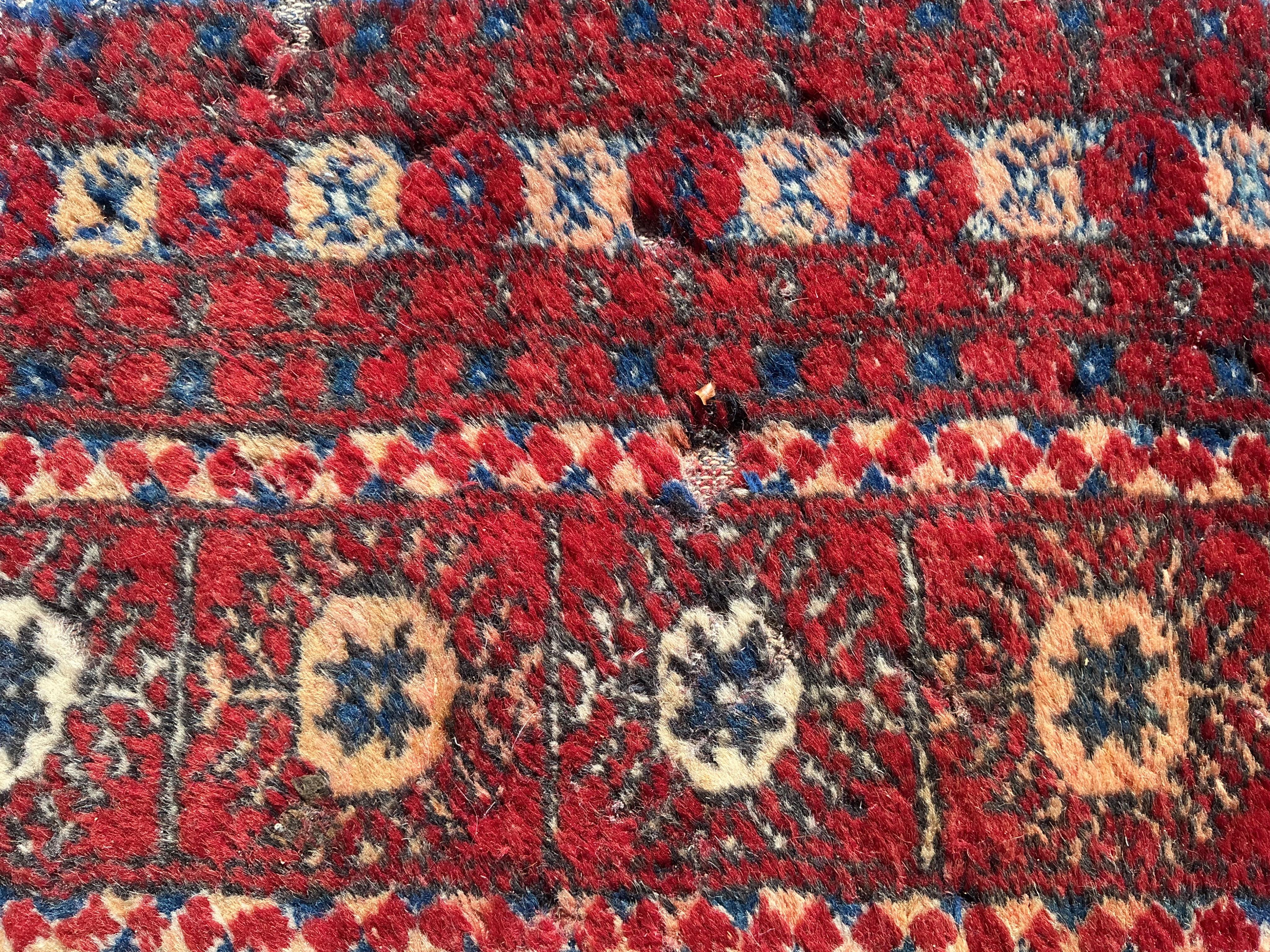 A Bokhara carpet, 345 x 215cm